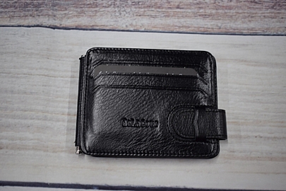 Ανδρικό δερμάτινο πορτοφόλι με ιδιαίτερο desing σε μαύρο χρώμα