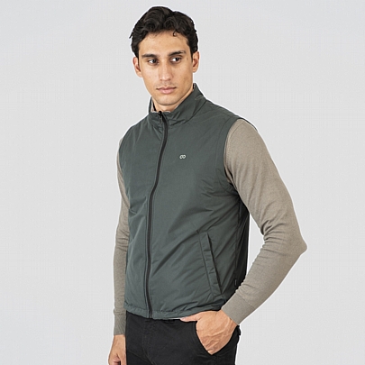 Aμάνικο γιλέκο διπλής οψης σε πράσινο σκούρο-γκρι του πάγου Aμάνικο γιλέκο διπλής οψης σε πράσινο σκούρο-γκρι του πάγου